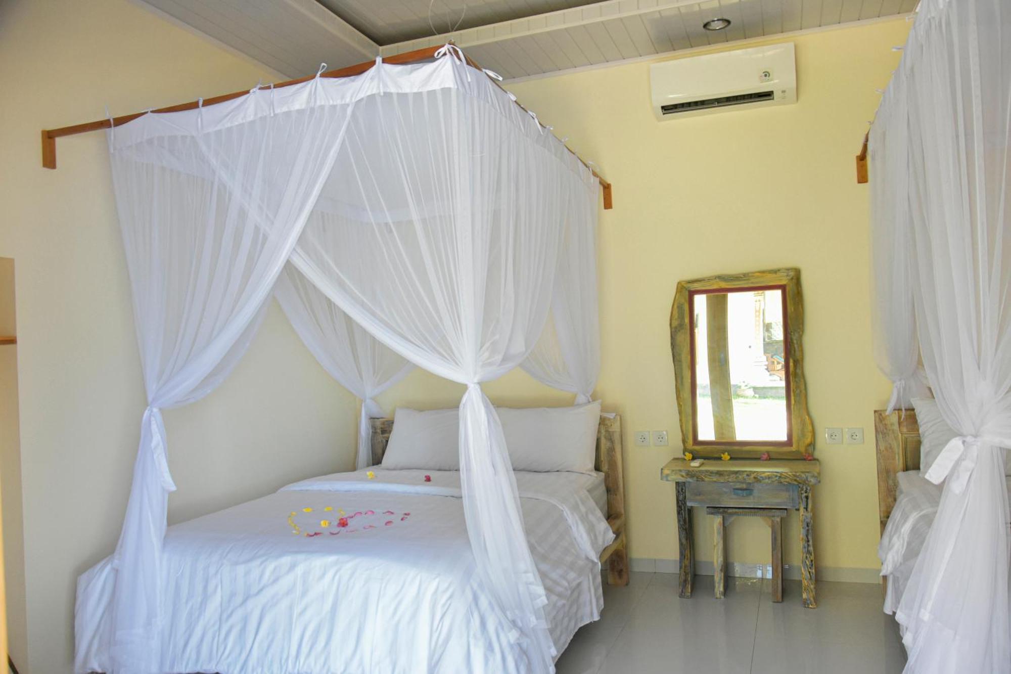 Hotel Ganesha Amed Zimmer foto